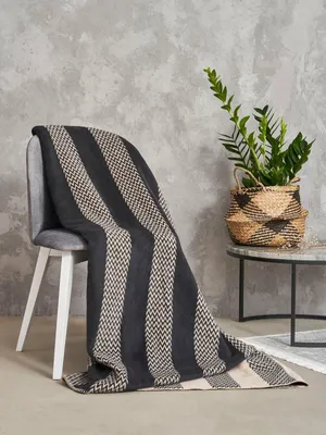 Produktbild von UMIPLED | Kuscheldecke, Sofaüberwurf Decke, Dicke Sofadecke, Couchdecke, Flauschige, Wohndecke für Couch, 150x200cm, - Schwarz/Beige