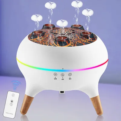 A white humidifier with a volcano-like top and wooden legs, emitting mist, with a remote control next to it.