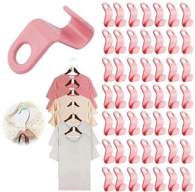 Image de Ibenzoa® : ensemble de 50 cintres pour vêtements, gain de place, avec crochet de connexion, en plastique, rose. Permet de relier plusieurs cintres, compatible avec les crochets de moins de 1 cm
