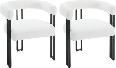 Two white fluffy chairs with black metal legs are shown against a white background.