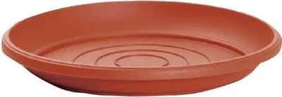 A terracotta plant saucer on a white background.