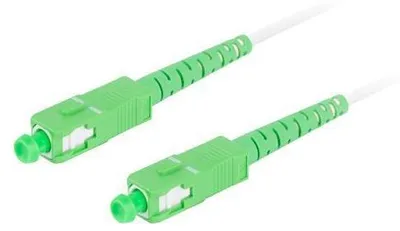 A close-up shot of two green fiber optic cable connectors.