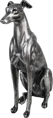 A silver-colored decorative dog figurine.