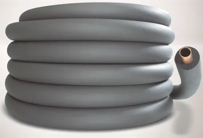 A coil of gray insulated pipe with a visible copper interior.