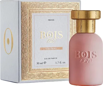 A perfume bottle and its box are displayed against a white background.