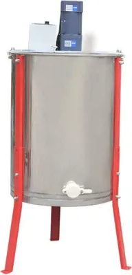A stainless steel honey extractor with red legs and a blue motor on top, set against a white background.