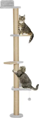 Two cats are playing on a multi-level cat tree.
