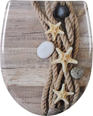 A toilet seat with a decorative print of a hemp rope, starfish, and stones on a wooden background.