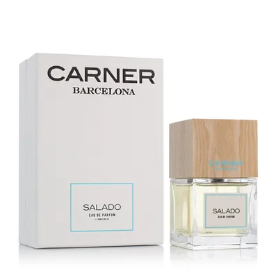 A perfume box and bottle are displayed against a white background.