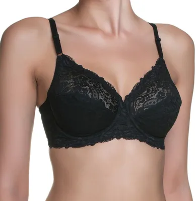 A woman wearing a black lace bra.