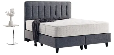 Immagine prodotto di Robusto letto grigio scuro con linee fluide su gambe robuste
