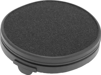 A black stamp pad is shown from a slightly elevated angle.