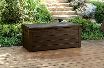 Productafbeelding van Buitenopslagkist van kunststof met houtstructuur, 145x60,3x69,7 cm, merk Keter, Brightwood, bruin