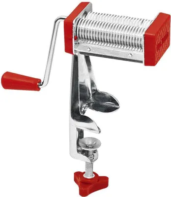 A close-up studio shot of a chrome and red pasta maker.