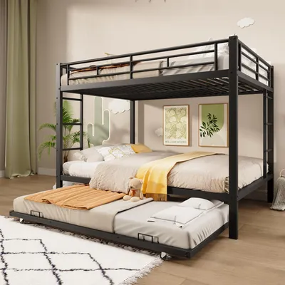 A black metal bunk bed with a pull-out trundle bed, set up in a room with decorative wall art and a rug.
