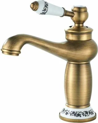 A close-up studio shot of a retro-style bathroom faucet with a ceramic handle.