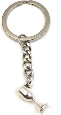 Produktbild von Onwomania Schlüsselanhänger Segelboot mit Lenkrad Bronze Metall Anhänger Charm
