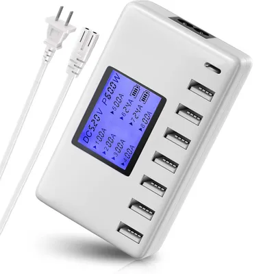 A white multi-port USB charger with a display screen and two power cables.