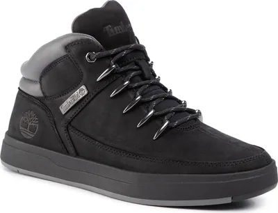 A black Timberland boot is shown against a white background.