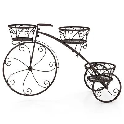 A decorative metal plant stand shaped like a bicycle.