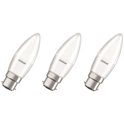 Three white LED light bulbs with silver bases are arranged diagonally on a white background.