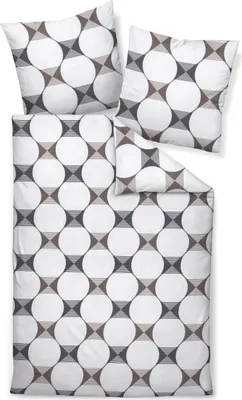A set of bedding, including a duvet cover and two pillowcases, laid out flat on a white background.