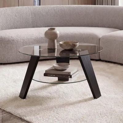 Productafbeelding van MCA bijzettafel/salontafel HWC-P59, geschikt als bijzettafel, koffietafel of salontafel, met een massief houten frame en een rond glazen blad met een diameter van 75 cm, afgewerkt in eikenhout en zwart