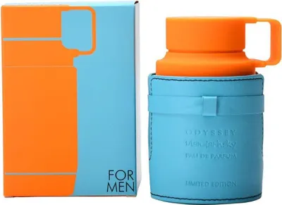 A product shot of a perfume bottle and its box, both featuring a striking orange and light blue color scheme.
