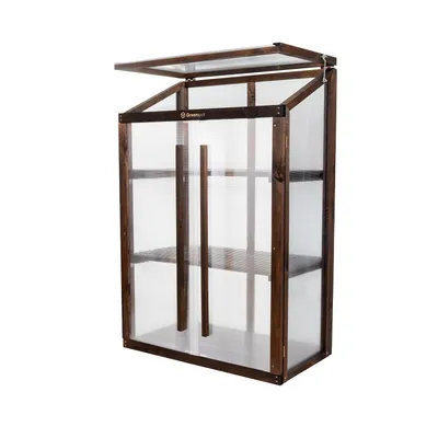 A mini greenhouse with wooden frame and clear plastic panels, shown against a white background.