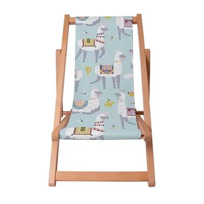A wooden deck chair with a fabric seat featuring a pattern of llamas and cacti.