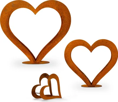 Three rusted metal heart sculptures of different sizes are displayed against a white background.