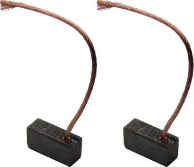 Two carbon brushes with copper wires attached, isolated on a white background.