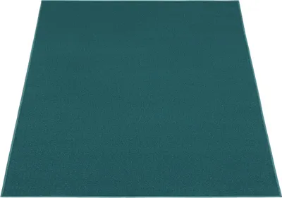 A square teal rug is shown from a slightly elevated diagonal angle against a white background.
