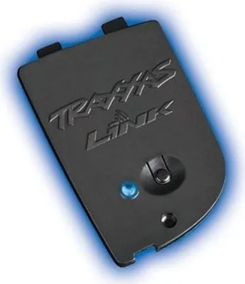 A black Traxxas Link wireless Bluetooth module with a blue LED light.