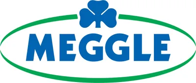 The Meggle logo is displayed prominently in the center of the image, set against a clean white background. The logo features the brand name 'MEGGLE' in bold blue lettering, enclosed within a green oval shape. Above the text, a blue shamrock symbol is posit