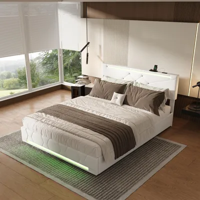 A modern bedroom with a large window overlooking a green landscape, featuring a white bed with LED lighting.