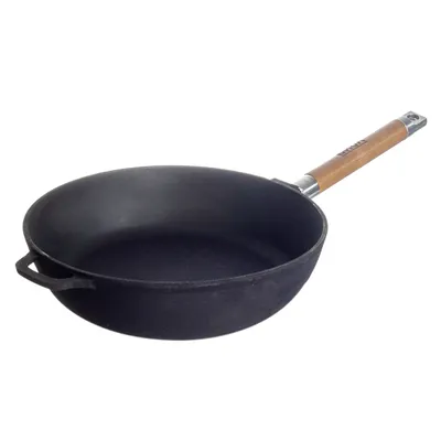A cast iron frying pan with a wooden handle is shown against a white background.