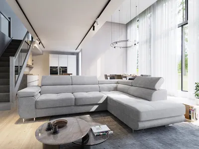 A modern living room with a large sectional sofa, coffee table, and dining area visible in the background.