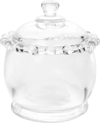 A clear glass jar with a lid and decorative beaded rim.
