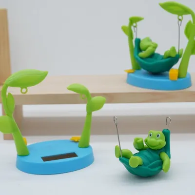 Productafbeelding van Autoornament op zonne-energie met schommelende schildpadfiguurtjes