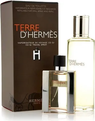 A gift set of Hermès Terre D'hermes Eau de Toilette, featuring a full-size bottle and a travel spray, presented with its packaging.