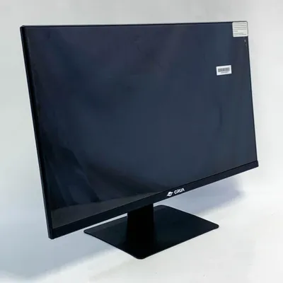 A black computer monitor on a white background.