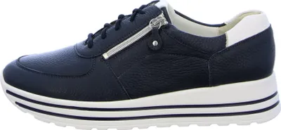 A side view of a navy blue and white sneaker.