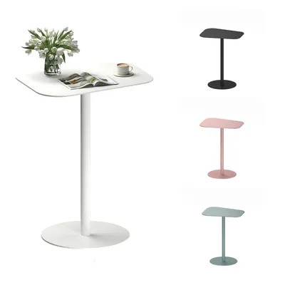 A white side table with a vase of flowers, a magazine, and a cup of coffee on top, shown in the foreground. To the right, three smaller images show the same table design in black, pink, and blue.