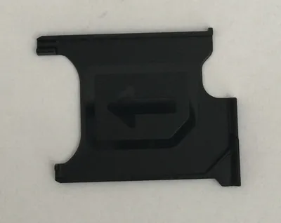 A black SIM card tray for a Sony Xperia Z1 Compact is shown on a light gray background.