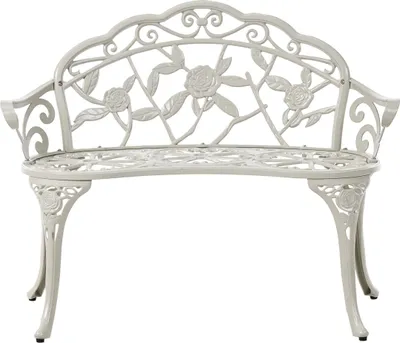 A white metal garden bench with ornate rose detailing.