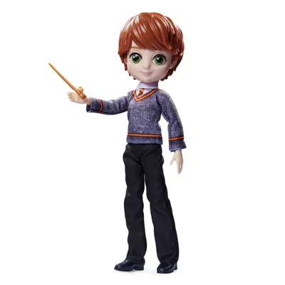 A doll of the character Ron Weasley from Harry Potter, holding a wand.
