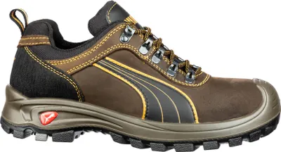 A side view of a brown Puma safety shoe against a white background.