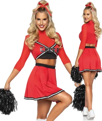 A woman dressed as a cheerleader poses with pom-poms.