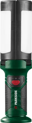 A studio shot of a green and black LED work light.